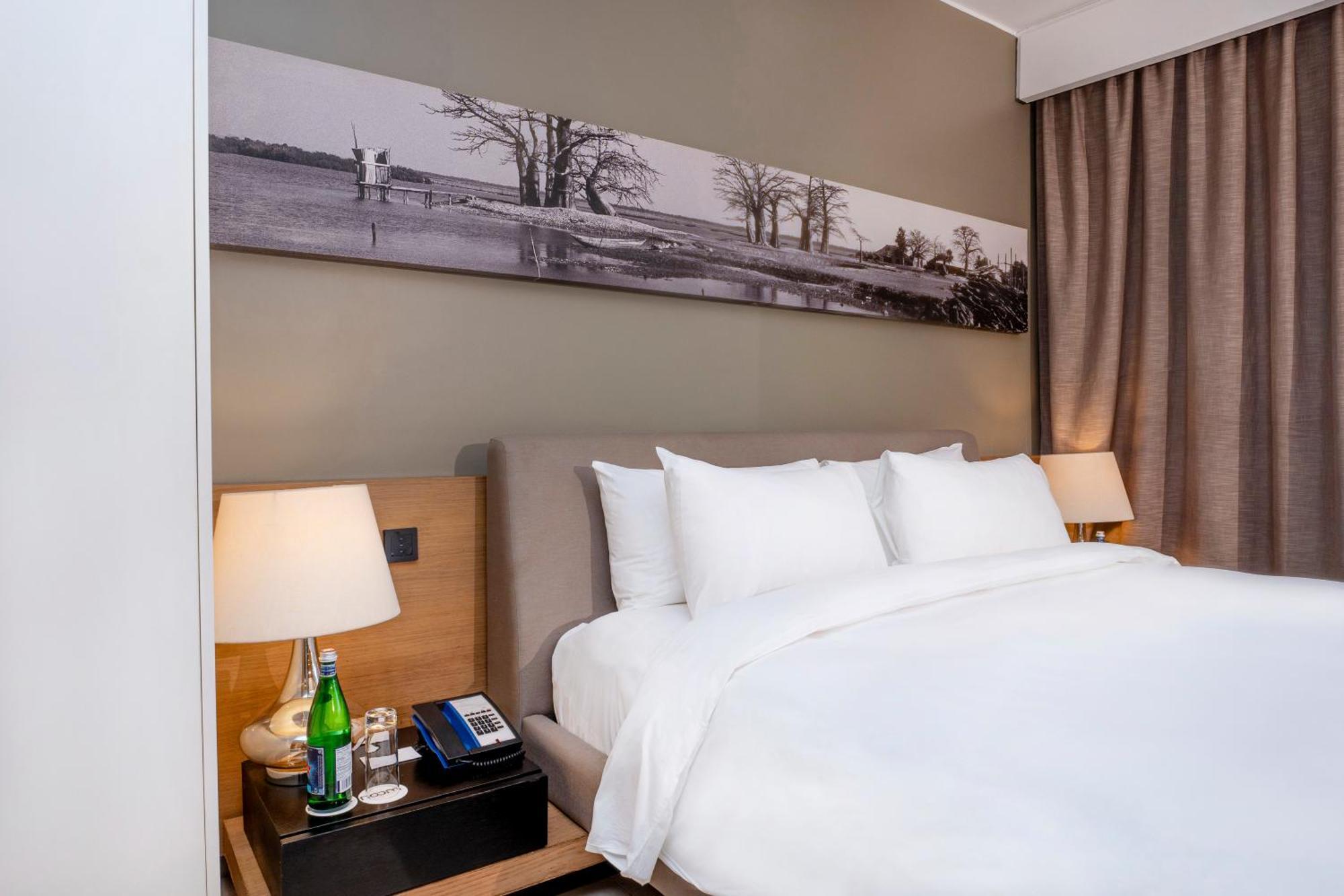 Noom Hotel Dakar Sea Plaza, A Member Of Radisson Individuals Exterior foto A bedroom at the hotel